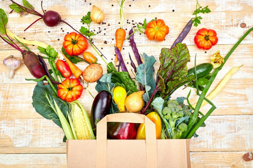 Paper bag of different health vegetables food